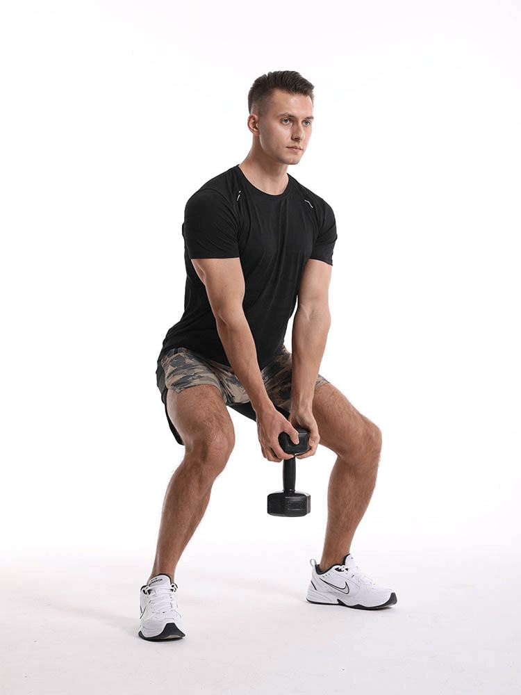 Man exercising with a dumbbell in a Casual Short Sleeves Basketball Elastic T-shirt for Men, showcasing breathable athletic wear.
